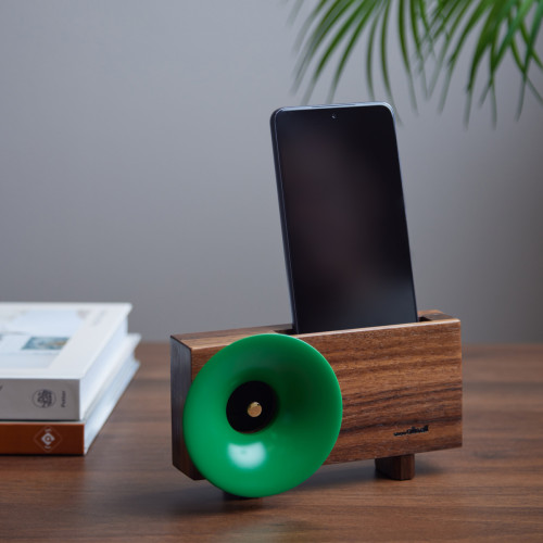 wooden amplifier for smartphones. made from american hardwood with a jungle green coloured gramophone speaker detail on the left hand side.    