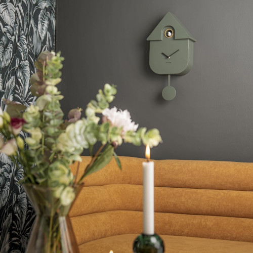 modern wall clock cuckoo clock in jungle green